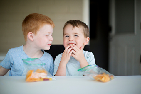 two boys eating
