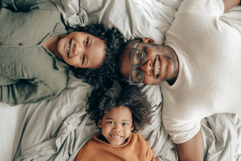 Family on bed